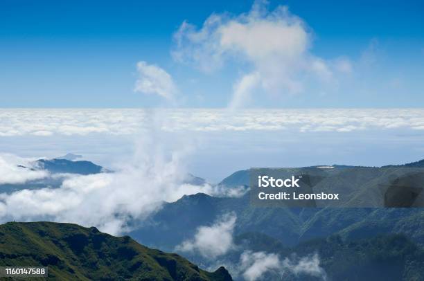 Trade Winds Bring Clouds And Rainy Weather Mountain Range Pico Ruivo In The Northeastern Edge Of The Central Highlands Madeira Stock Photo - Download Image Now
