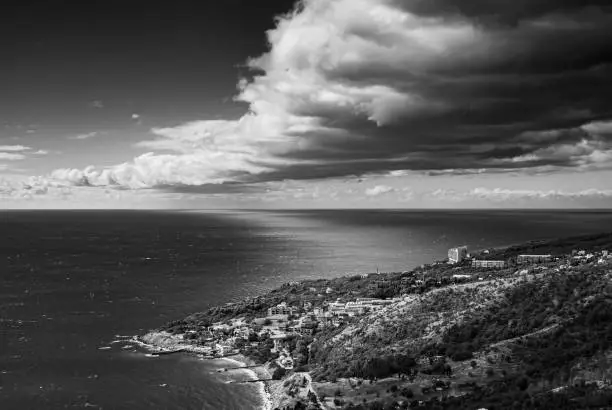 Black and white dramatic landscape with with Blue Bay at Black Sea shore near Katsiveli urban-type settlement, Crimean peninsula