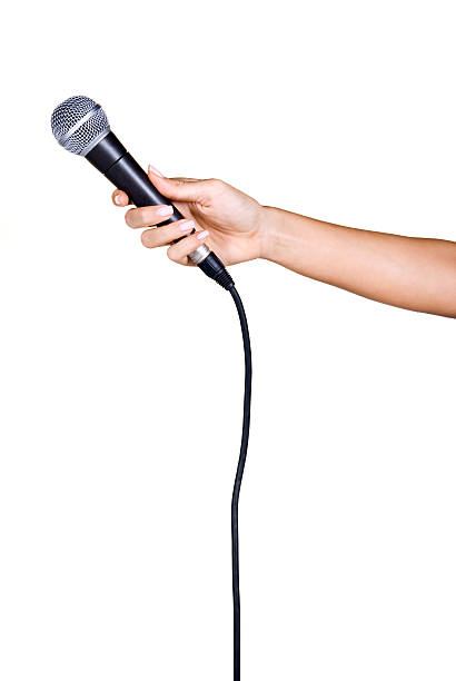 Holding a microphone stock photo