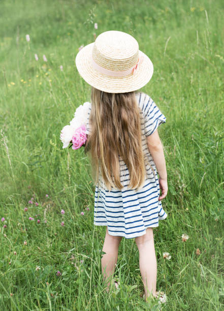 istock Back view beautiful little girl 1160154508