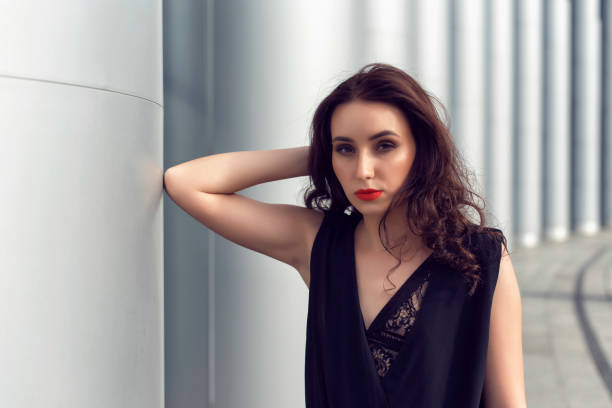 istock Spring walk in the city in fashionable clothes 1160156721