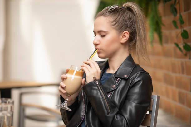 Coffee break .Young woman drinking coffee  Casual lifestyle