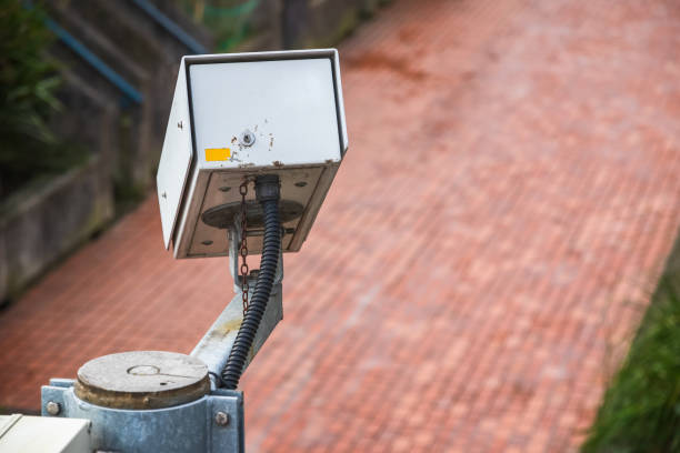 istock Surveillance camera facing an empty street in London 1160157468