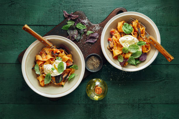 istock Pappardelle with eggplant, creamy tomato sauce and mozzarella 1160157477