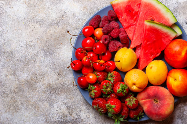 istock Different summer fruits and berries 1160161077