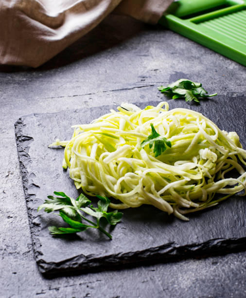 istock Raw green uncooked zucchini pasta 1160161103