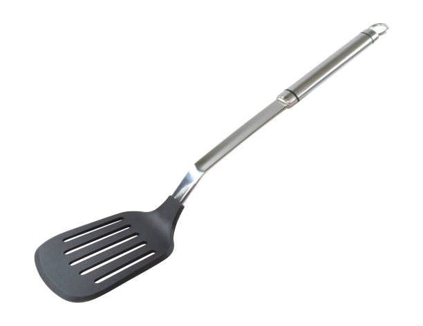 istock Stainless steel slotted cranked kitchen spatula isolated on white background. 1160161892