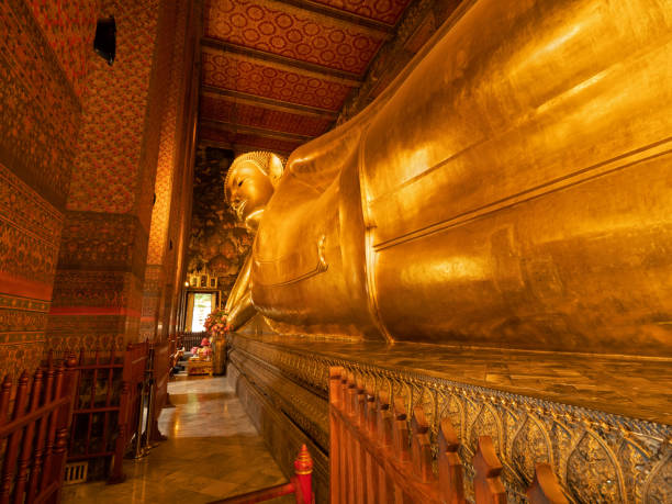 istock Close up Reclining Buddha Statue at Temple in Thailand 1160166562