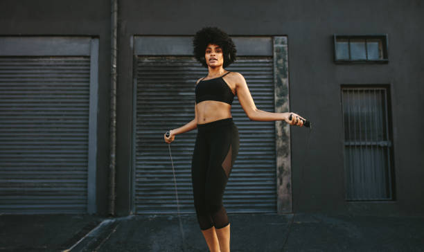 istock Fitness female doing skipping workout 1160171113