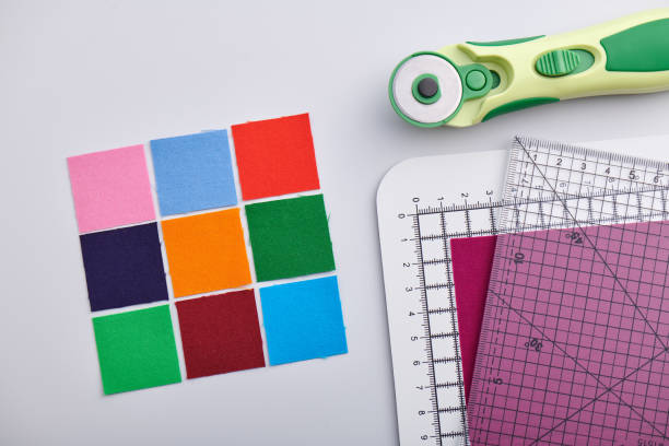 istock Bright square pieces of fabric and quilting accessories 1160171493