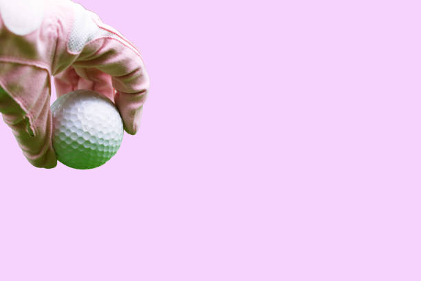 esfera de golfe com luva cor-de-rosa - golf women pink ball - fotografias e filmes do acervo