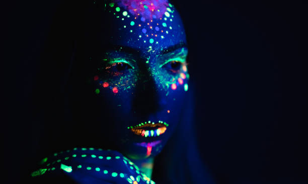 istock Woman with fluorescent makeup 1160174138