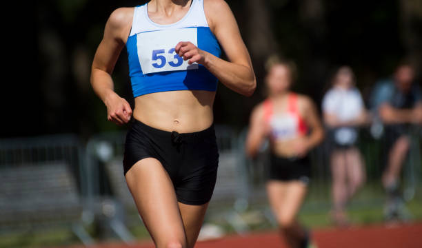istock Midsection Of Woman Running Marathon 1160174484