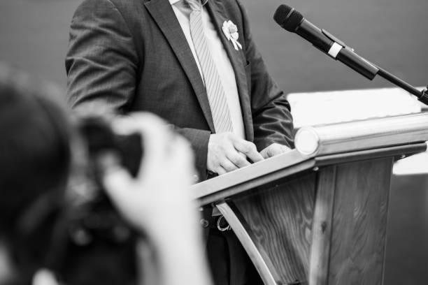 istock Midsection Of Businessman Giving Speech In Seminar 1160175904