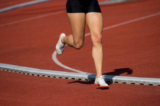 istock Low Section Of Women Running Marathon 1160176980