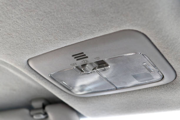 istock Switch for car interior lighting and warning of car doors not closing completely. 1160179169