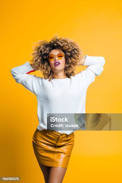 Beautiful Afro American Woman Model Stock Photo - Download Image Now - Sunglasses, Yellow Background, 1960-1969