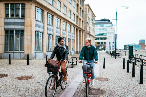 istock Gay couple riding bicycles 1160182969