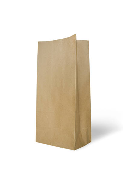 istock Brown paper bag isolated on white background 1160184310