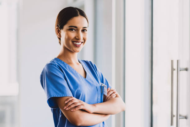 i am proud of my career choice - female nurse imagens e fotografias de stock