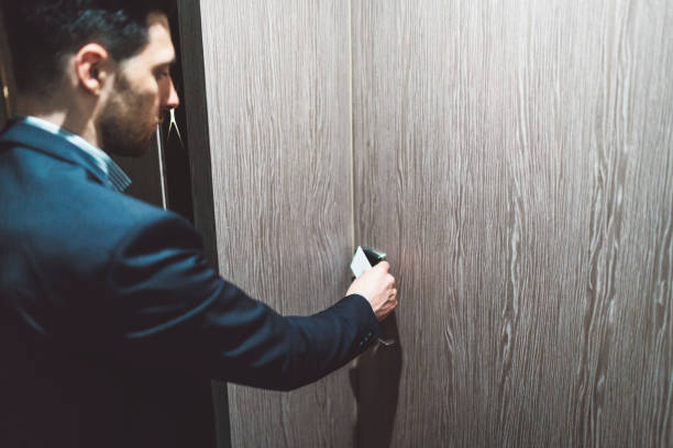 istock A businessman using a card to enter a hotel room 1160185690