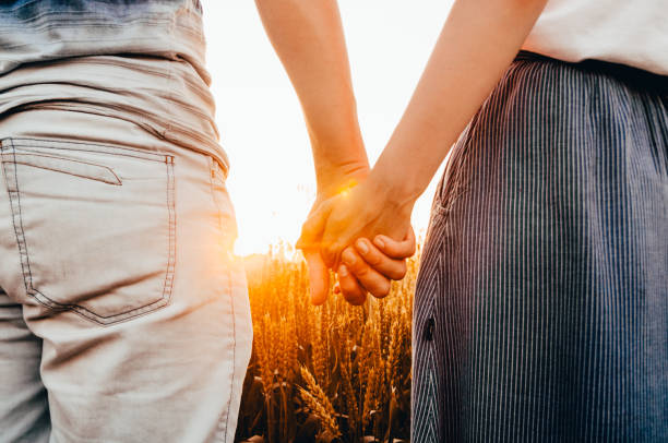 istock a couple in wheat field 1160187812