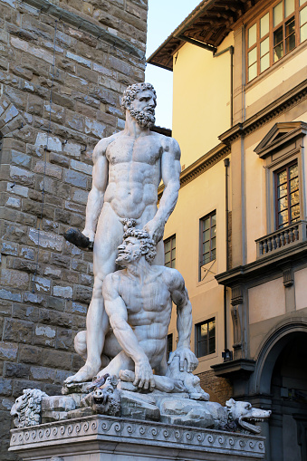 FLORENCE, ITALY - AUGUST 27, 2018: Hercules and Cacus statue from Giambologna in front of the Palazzo Vecchio on the Piazza della Signoria im historic center of Florence - Italy.