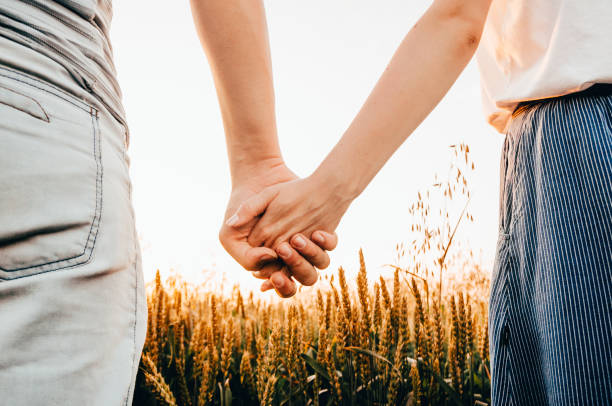 istock a couple in wheat field 1160188547