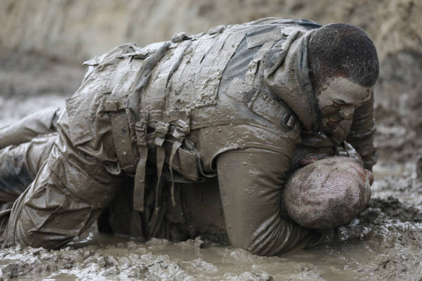 istock Krav Maga military muddy fighting duo 1160188946