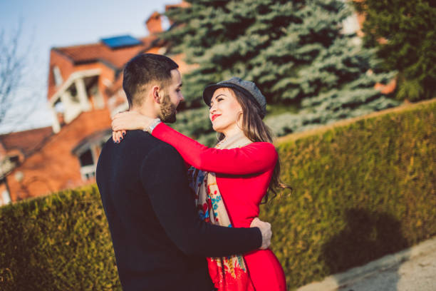 istock Man holding woman in his arms 1160189761