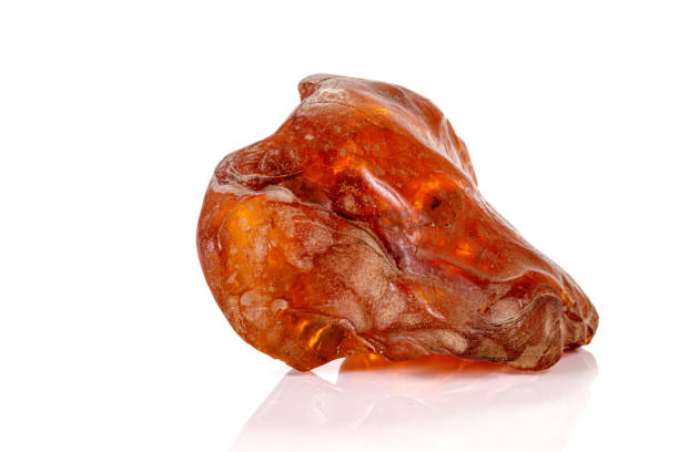 istock Macro stone amber mineral on white background 1160189918