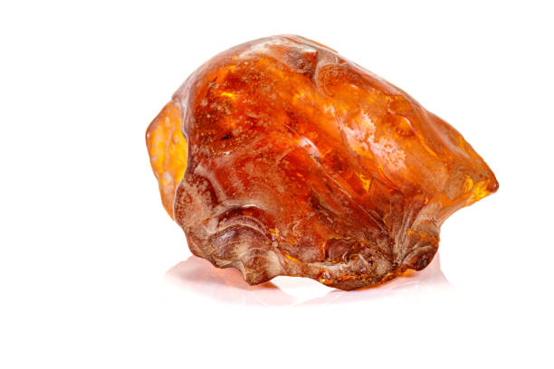 istock Macro stone amber mineral on white background 1160189939