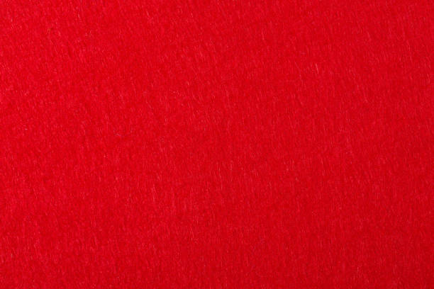 istock Felt background in red color useful for Christmas texture. 1160190146