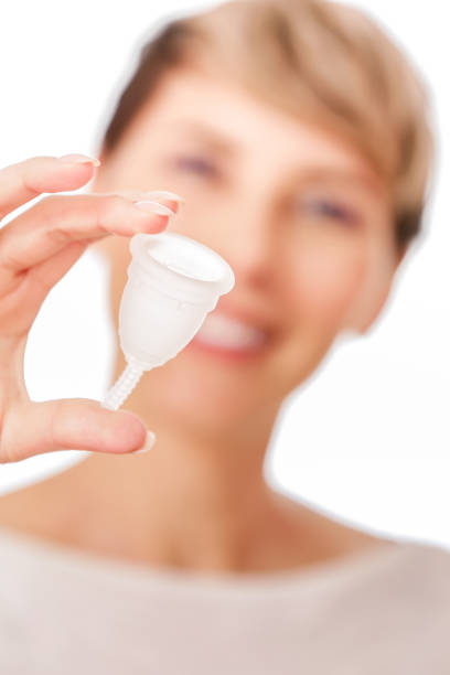istock Happy Young woman Holding a Silicone Menstrual Cup 1160193052