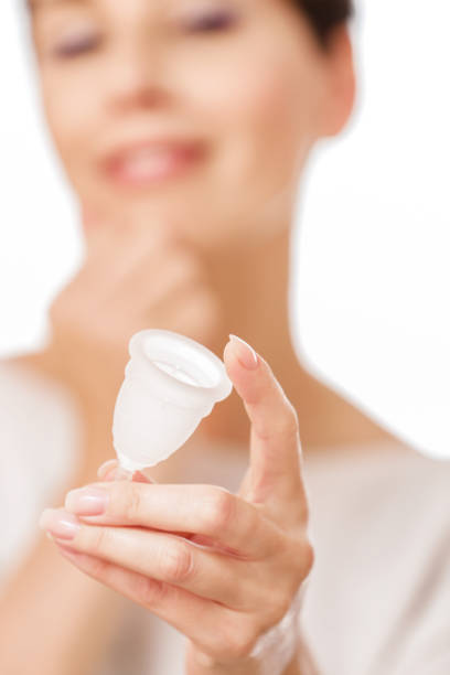 istock Happy Adult Woman Considering to start using a modern Menstrual Cup 1160193054