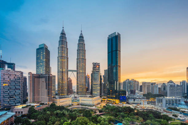 istock Kuala Lumpur Skyline with Petronas Towers at sunset 1160197764