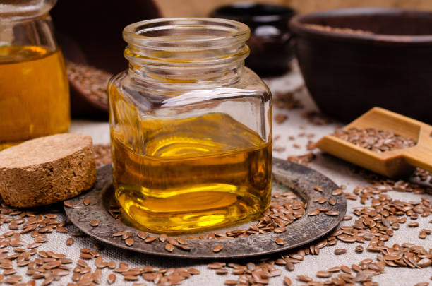 istock Organic flax oil in glass 1160197828