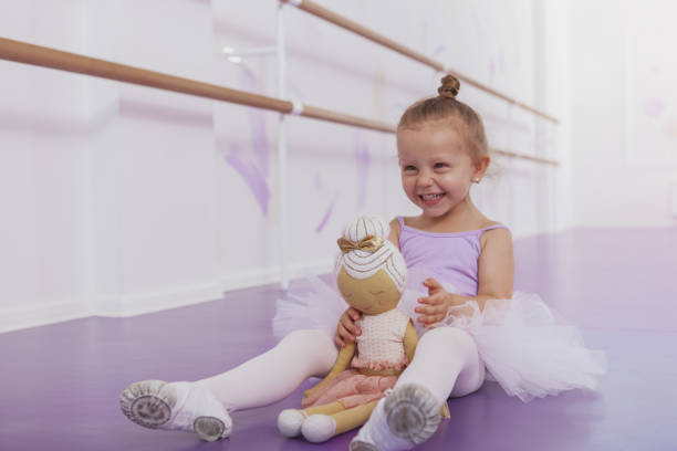 istock Adorable little ballerina at dancing school 1160198771