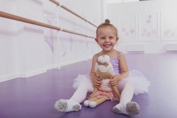 istock Adorable little ballerina at dancing school 1160198776