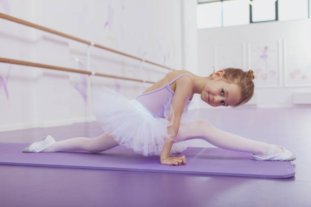 istock Adorable little ballerina at dancing school 1160198940