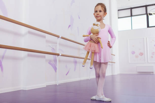istock Adorable little ballerina at dancing school 1160198986