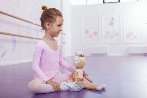 istock Adorable little ballerina at dancing school 1160198989