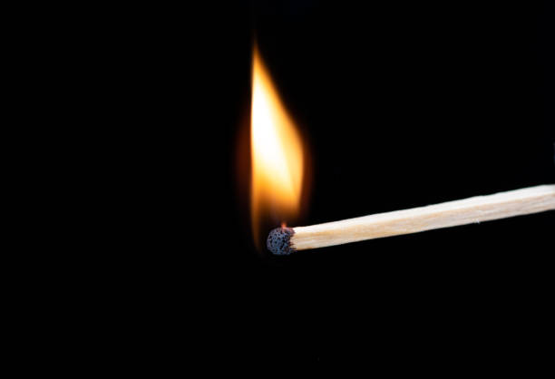 istock Lighting wooden matches at the moment when it explodes. 1160208058