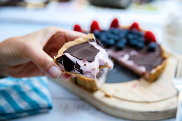 istock Homemade Chocolate cake with fresh blueberries  raspberries 1160209758