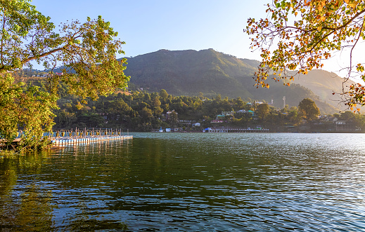 Scenic Bhimtal lake with mountains at Nainital Uttarakhand India. Bhimtal mountain lake is a popular tourist destination