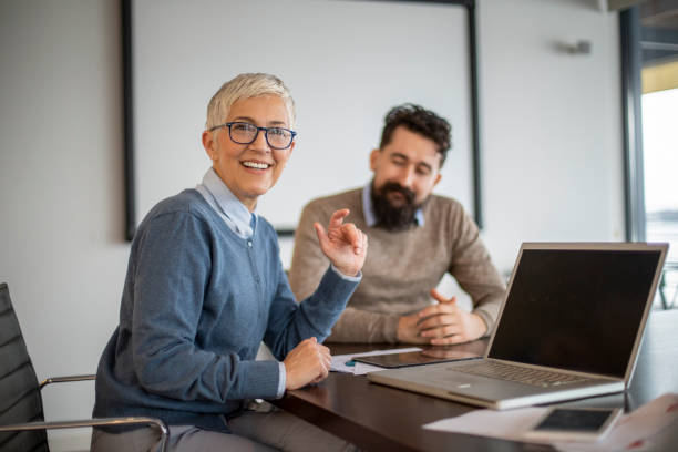 istock Business duo brainstorming the session 1160211765