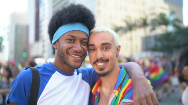 Portrait of male couple during LGBTQI parade