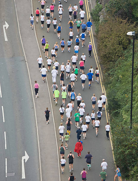 maraton biegaczy - marathon aerial view crowd running zdjęcia i obrazy z banku zdjęć