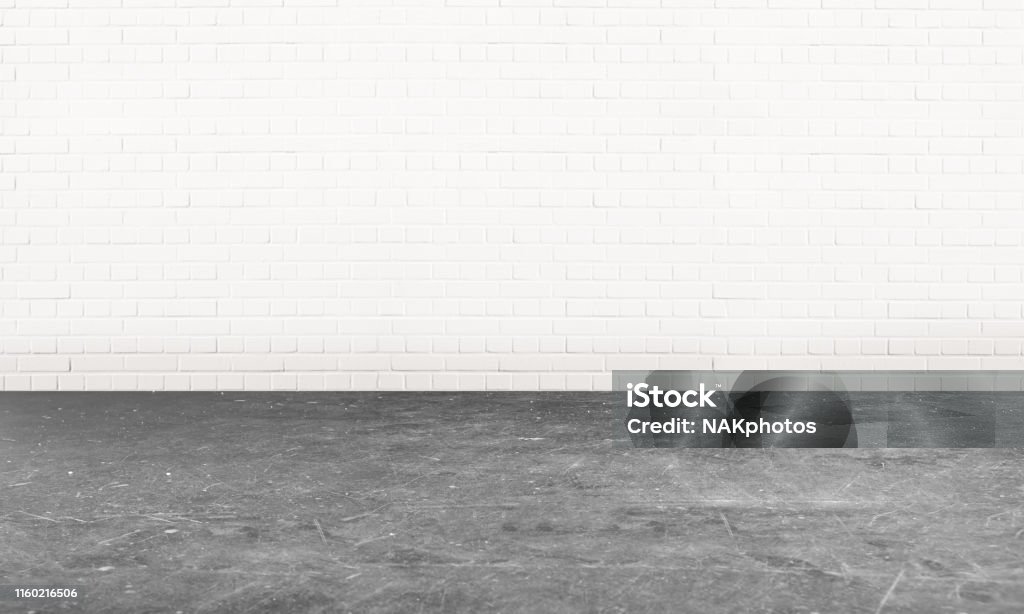 Empty garage room with a cement flooring An empty white room with a grey cement floor Flooring Stock Photo