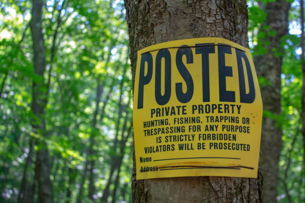 istock Tree posted sign Private Property no trespassing 1160222209